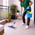 Cleaner mopping the apartment balcony
